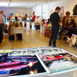 Our desk with some photographic prints made from original vintage Polapaintings